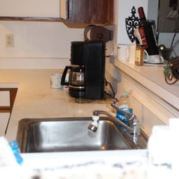 old stained countertop and sink old stained countertop and sink