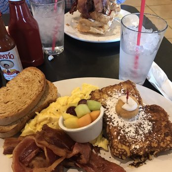 Maple Leaf Diner - French toast, bacon, fruit, eggs, wheat toast & cream puff. Plus the chicken & waffles in the back. - American Near Me - Dallas, Texas Maple Leaf Diner - French toast, bacon, fruit, eggs, wheat toast & cream puff. Plus the chicken & waffles in the back. - American Near Me - Dallas, Texas