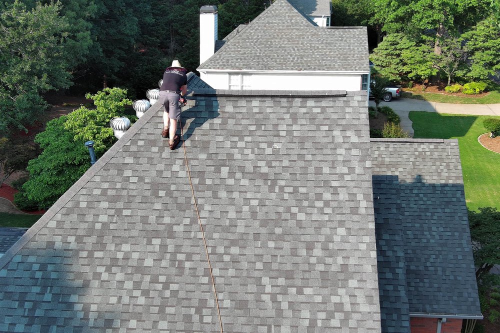 Slide of The Roofing Company