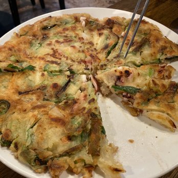 Modoo Restaurant - Haemul pajeon (seafood pancake) - tasted great, crispy exterior and chewy inside - Korean Near Me - Lynnwood, Washington Modoo Restaurant - Haemul pajeon (seafood pancake) - tasted great, crispy exterior and chewy inside - Korean Near Me - Lynnwood, Washington