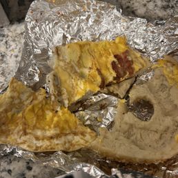 The one piece of bacon on my sandwich Meat & Egg Sandwich The one piece of bacon on my sandwich Meat & Egg Sandwich