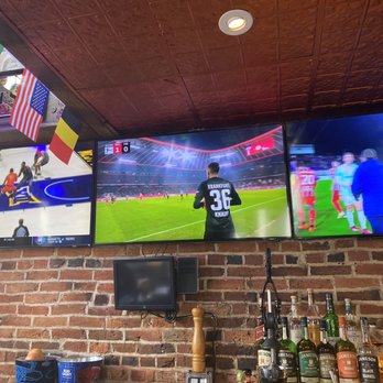 Claddagh Pub - two televisions displaying a soccer game - Irish Pub Near Me - Baltimore, Maryland