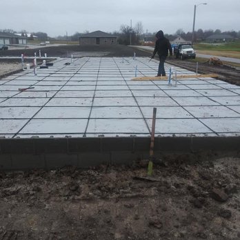 Tamayo Construction - a man standing on a concrete slab - General Contractors Near Me Tamayo Construction - a man standing on a concrete slab - General Contractors Near Me