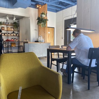Caffeine Roasters - The bathroom that makes everyone look up at the commotion. - Coffee Roasteries Near Me - Tampa, Florida