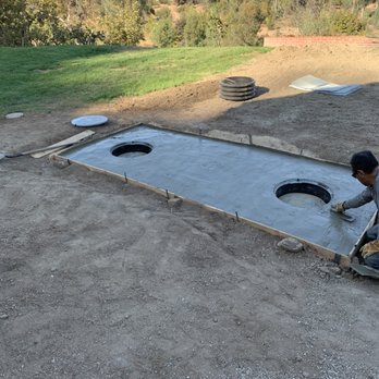Canyon Septic Services - traffic-rated cement pad and access ports on the new tank. - Septic Services Near Me - Orange, California Canyon Septic Services - traffic-rated cement pad and access ports on the new tank. - Septic Services Near Me - Orange, California