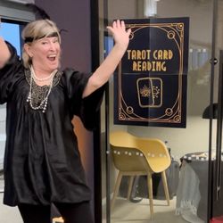Tarot Card Reader Angela Lucy reading Tarot at a Roaring 20s themed Christmas Office Party in Philadelphia