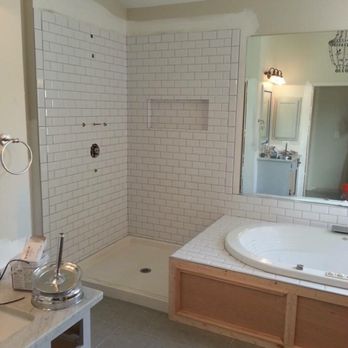 Atlanta Flooring Group - a bathroom with a large tub - Carpet Installation Near Me Atlanta Flooring Group - a bathroom with a large tub - Carpet Installation Near Me