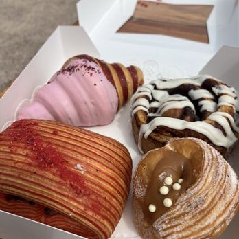 Paris En Rose - Our selection of pastries- raspberry chocolate pastry, raspberry rose croissant, salted caramel cruffin, cinnamon bun. - Cafes Near Me - Del Mar, California Paris En Rose - Our selection of pastries- raspberry chocolate pastry, raspberry rose croissant, salted caramel cruffin, cinnamon bun. - Cafes Near Me - Del Mar, California