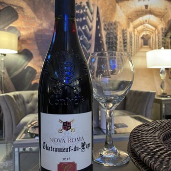 Frederick’s Wine Room - a bottle of wine and a glass - Wine Bars Near Me - DeBary, Florida Frederick’s Wine Room - a bottle of wine and a glass - Wine Bars Near Me - DeBary, Florida