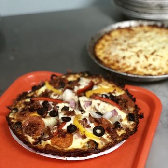 Delicias Pizzeria - two pizzas on a tray - Pizza Near Me - Miami, Florida Delicias Pizzeria - two pizzas on a tray - Pizza Near Me - Miami, Florida