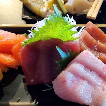 Etcetera Sushi & Thai Bites - (chefs choice 12 piece) left, salmon, front center tuna, next to that sea base and behind that yellowtail served also with fried onions. - Sushi Bars Near Me - Corona, California Etcetera Sushi & Thai Bites - (chefs choice 12 piece) left, salmon, front center tuna, next to that sea base and behind that yellowtail served also with fried onions. - Sushi Bars Near Me - Corona, California