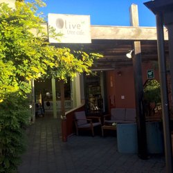 Olive Tree Cafe - Front entrance is set at the back and of a courtyard shared with the entrances to other businesses.