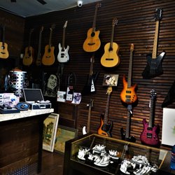 One Stop Pawn - Guitar Wall