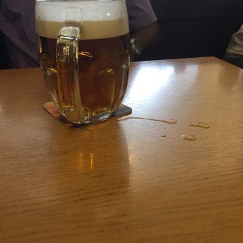 U Glaubiců - The beer spills on the table after being dumpef - Czech Near Me - Prague, Puerto Rico