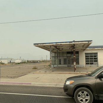 Green River City Shop - a car parked in front of a gas station - Convenience Stores Near Me - Green River, Utah