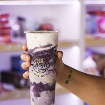 Magic Tea Market - a hand holding a cup of ice cream - Bubble Tea Near Me - Mount Dora, Florida Magic Tea Market - a hand holding a cup of ice cream - Bubble Tea Near Me - Mount Dora, Florida