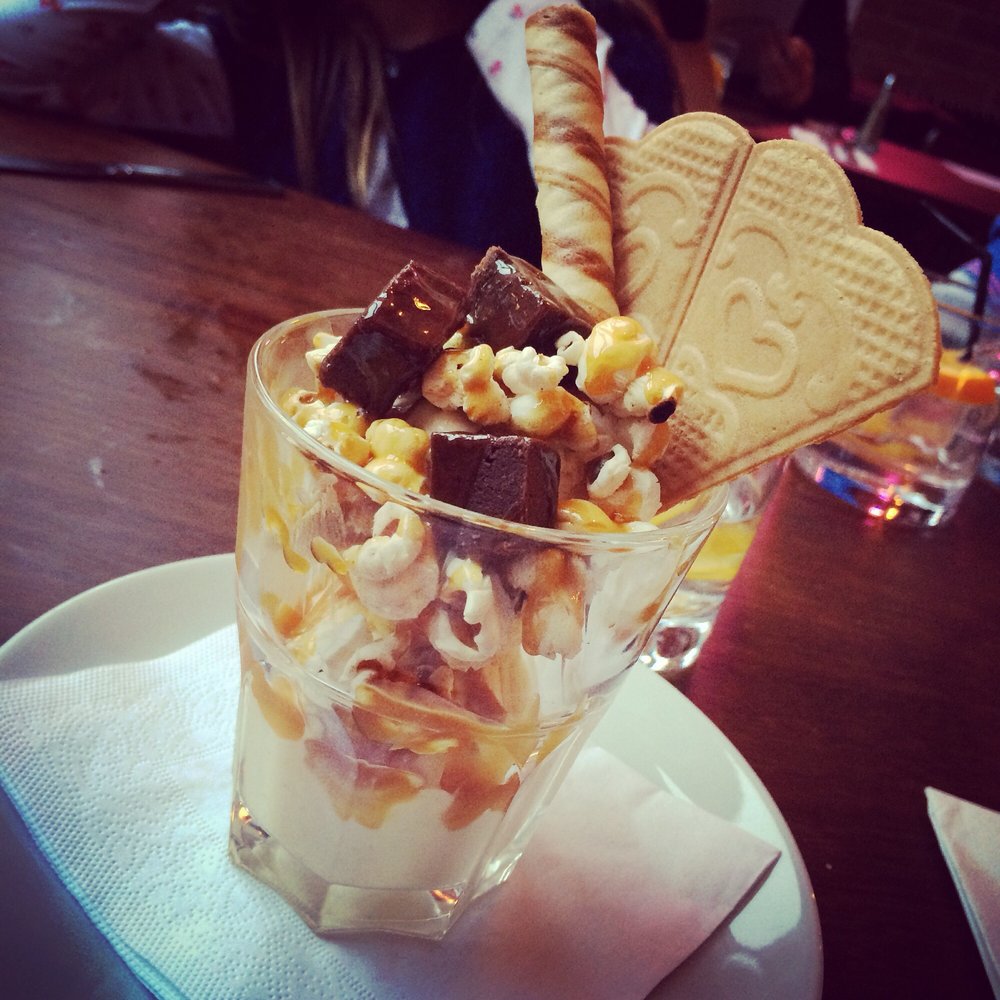 Mora Bar and Kitchen - Delicious dessert of salted popcorn ice-cream with caramel and chunks of brownie. - Italian Near Me - Glasgow, GLG