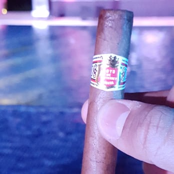 Live Aqua Resort - Cuban cigar on balcony - Resorts Near Me - Cancún, ROO