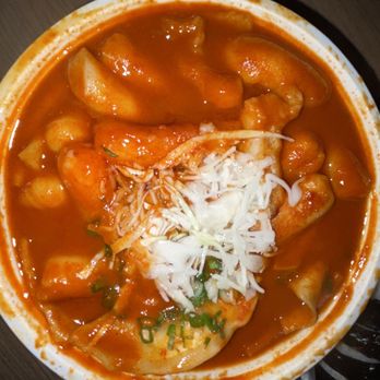 K-Bop - a bowl of soup with cheese on top - Korean Near Me - Austin, Texas K-Bop - a bowl of soup with cheese on top - Korean Near Me - Austin, Texas