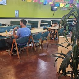 Menu and restaurant interior.