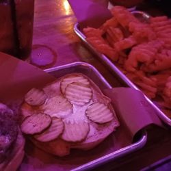 The Jackalope - This was my wife's burger and fries. It was really dark in the bar.
