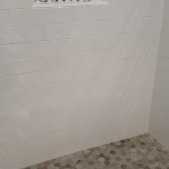 Taylor Made Tile - laser straight cuts and great symmetry plus an awesome limestone floor - General Contractors Near Me