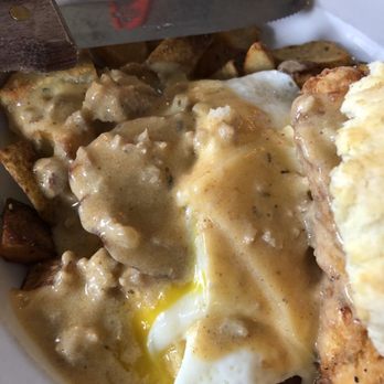 Cast Iron Kitchen - Chicken biscuit with egg, bacon, and sausage gravy. - Southern Near Me - Wilmington, North Carolina Cast Iron Kitchen - Chicken biscuit with egg, bacon, and sausage gravy. - Southern Near Me - Wilmington, North Carolina