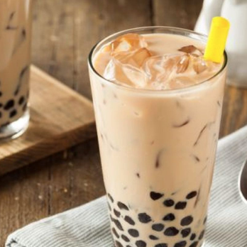 Tasteas - a glass of bubble tea on a table - Bubble Tea Near Me - Sioux Falls, South Dakota Tasteas - a glass of bubble tea on a table - Bubble Tea Near Me - Sioux Falls, South Dakota
