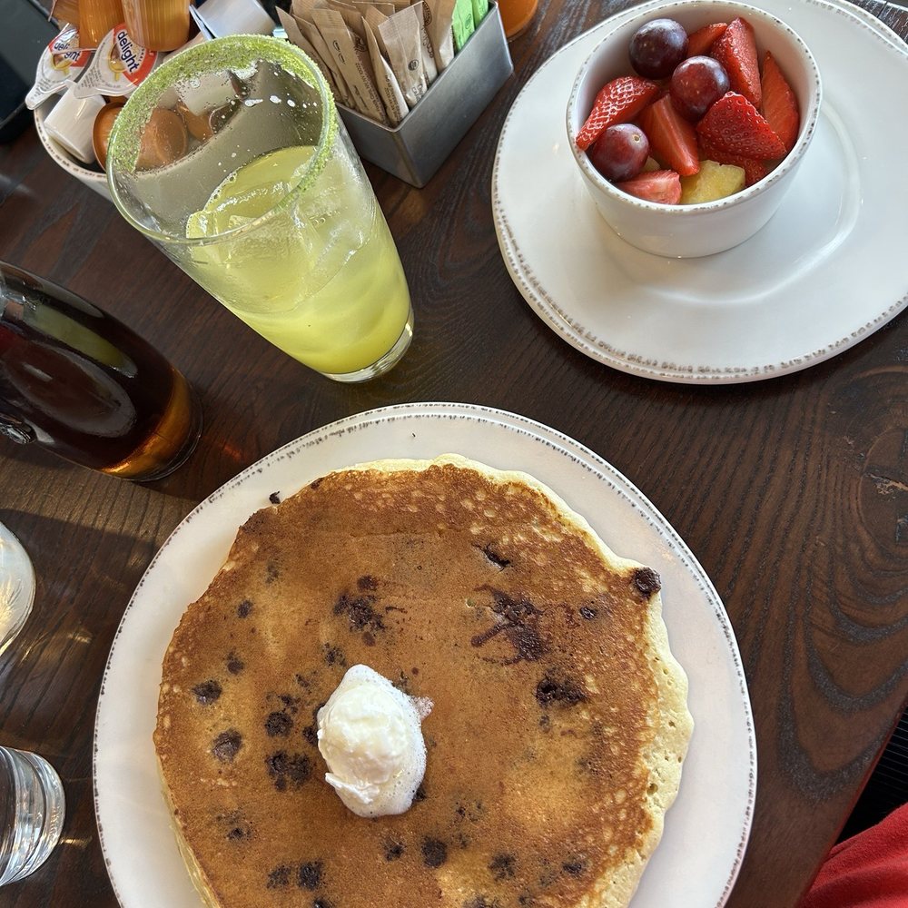 First Watch - Chocolate chip pancake with side of fruit - Breakfast & Brunch Near Me - Overland Park, Kansas