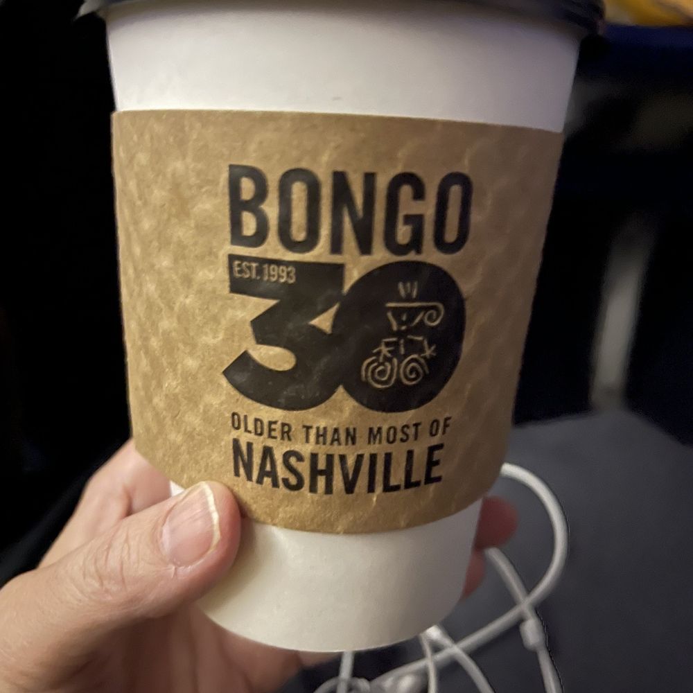 Bongo Java - a hand holding a coffee cup - Coffee & Tea Near Me - Nashville, Tennessee Bongo Java - a hand holding a coffee cup - Coffee & Tea Near Me - Nashville, Tennessee