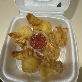 Thai Cuisine - a container of fried food - Thai Near Me - Spring Hill, Florida Thai Cuisine - a container of fried food - Thai Near Me - Spring Hill, Florida