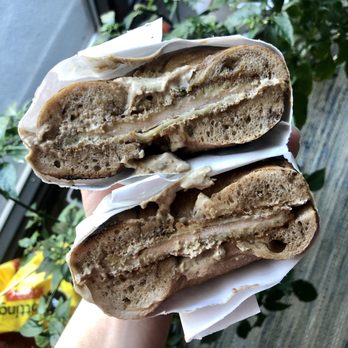 Gotham Bagels - Lakeview  - The Hyde Park - April's special with fried chicken, walnut cream cheese, hot maple syrup, and a cinnamon raisin bagel - Bagels Near Me - Chicago, Illinois