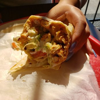 Tacos La Bala - Half of the burrito that was only 5.15. - Mexican Near Me - Houston, Texas Tacos La Bala - Half of the burrito that was only 5.15. - Mexican Near Me - Houston, Texas