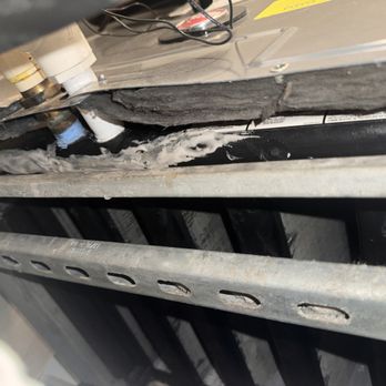 Eli Cleaning Services - they broke the pan then tried to cover the problem with white glue. - Air Duct Cleaning Near Me