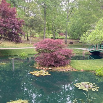 Gibbs Gardens - Bridge and pond - Botanical Gardens Near Me - Ball Ground, Georgia Gibbs Gardens - Bridge and pond - Botanical Gardens Near Me - Ball Ground, Georgia