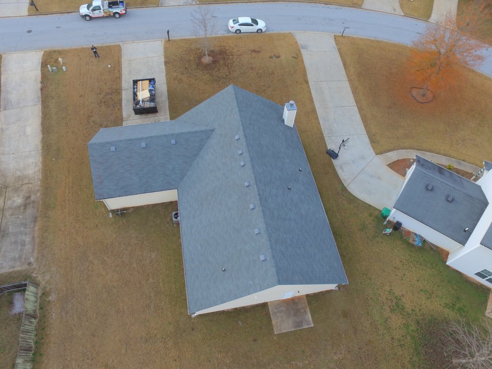 Slide of Empire Roofing & Restoration