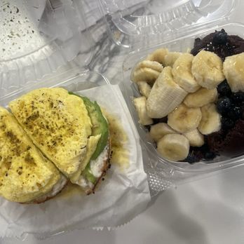 Bagelmania - Bagel C C A L P on Lightly Toasted Garlic Bagel with Extra Cream Cheese, Jalepeno, and add Egg (Left) & Acai Bowl (Right) - Coffee & Tea Near Me - Huntington Beach, California