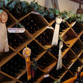 Findleton Estate & Winery - a display of wine bottles - Wineries Near Me - Camino, California