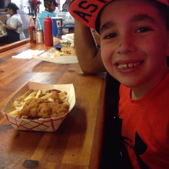 Miller's Cafe - Featherless Chicken and all smiles - Burgers Near Me - Houston, Texas