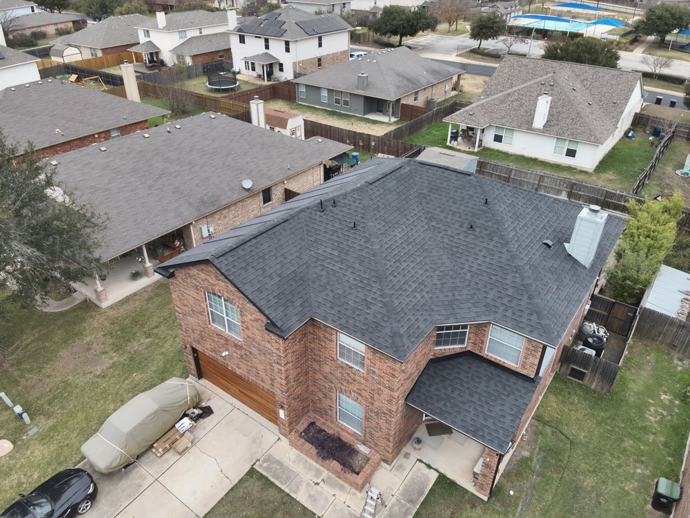 Slide of Action Roofing & Construction