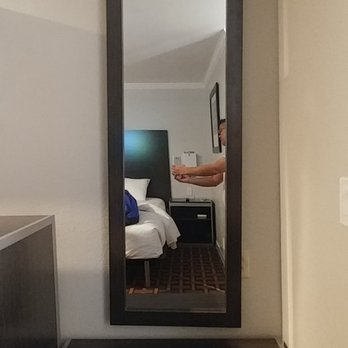 Sand Castle Inn - This mirror is really crooked. The contractor should have just moved this over to the left by like 4-5". - Hotels Near Me - Seaside, California Sand Castle Inn - This mirror is really crooked. The contractor should have just moved this over to the left by like 4-5". - Hotels Near Me - Seaside, California