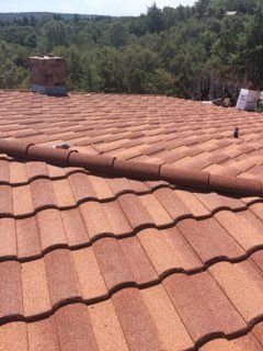 Slide of Eli Roofing