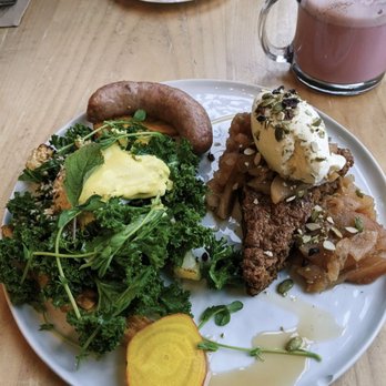 Nourish In The Harbour - Half and Half (Sleeping Beauty Pancakes and Golden Benny, half portions of each; $18) with side of featured sausage ($5) - Breakfast & Brunch Near Me - Victoria, British Columbia Nourish In The Harbour - Half and Half (Sleeping Beauty Pancakes and Golden Benny, half portions of each; $18) with side of featured sausage ($5) - Breakfast & Brunch Near Me - Victoria, British Columbia