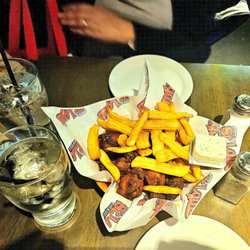 One pound of St. Louis hot wings and their signature golden fries along with their famous garlic dill sauce.