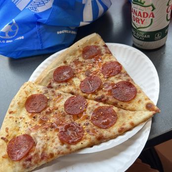 Jay Street Fresh 99 Cent Pizza - Pepperoni pizza with hot sauce, pepper flakes and garlic powder - Pizza Near Me - Brooklyn, New York Jay Street Fresh 99 Cent Pizza - Pepperoni pizza with hot sauce, pepper flakes and garlic powder - Pizza Near Me - Brooklyn, New York