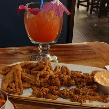 Aguacates Mexican Cantina - Strawberry Margarita with Calamari with chipotle dip - Mexican Near Me - Buffalo, New York Aguacates Mexican Cantina - Strawberry Margarita with Calamari with chipotle dip - Mexican Near Me - Buffalo, New York