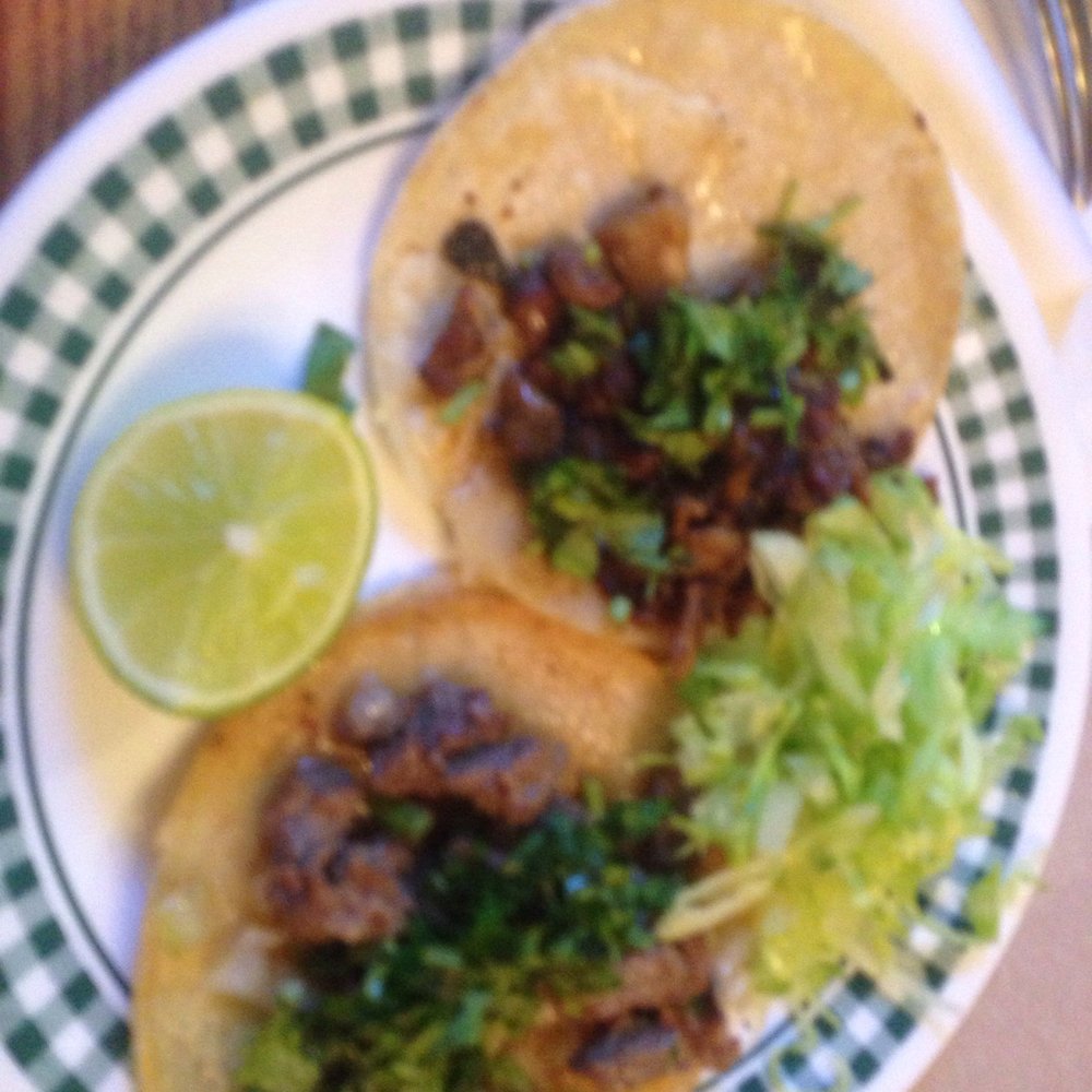 Steak tacos ! Cilantro and onions. Very yummy. Steak tacos ! Cilantro and onions. Very yummy.