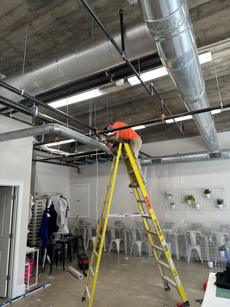 Slide of Ricky’s Plumbing