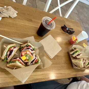 Julie's Cafe - Turkey cranberry sandwich on the left and Club Sandwich on the right. Don't get the iced coffee. The lid makes the coffee leak - Sandwiches Near Me - Chino, California Julie's Cafe - Turkey cranberry sandwich on the left and Club Sandwich on the right. Don't get the iced coffee. The lid makes the coffee leak - Sandwiches Near Me - Chino, California