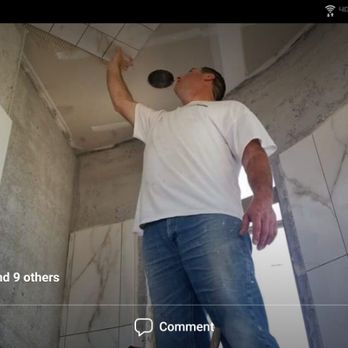 Sarment Tile - a man standing in a bathroom - General Contractors Near Me Sarment Tile - a man standing in a bathroom - General Contractors Near Me